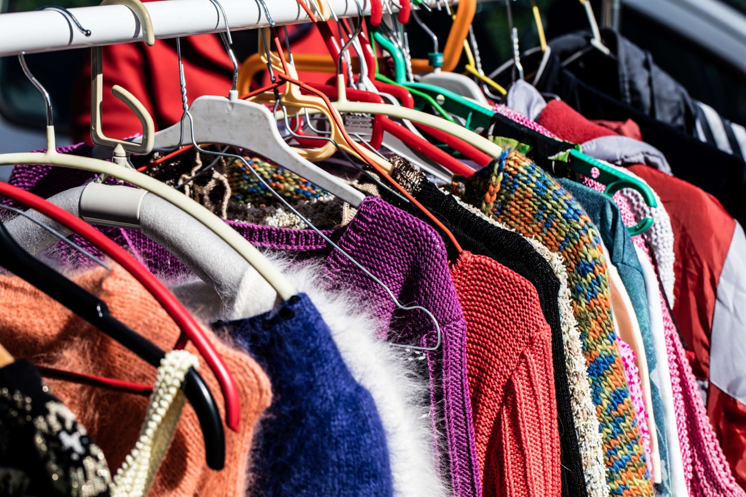 Background image: Rack of Clothes